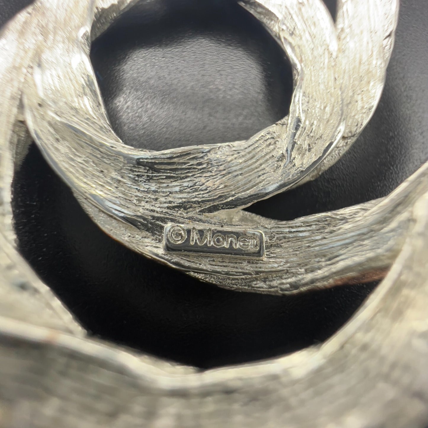 Vintage Beautiful Monet Signed Twisted Knot Silver-Toned Textured Brooch Pin