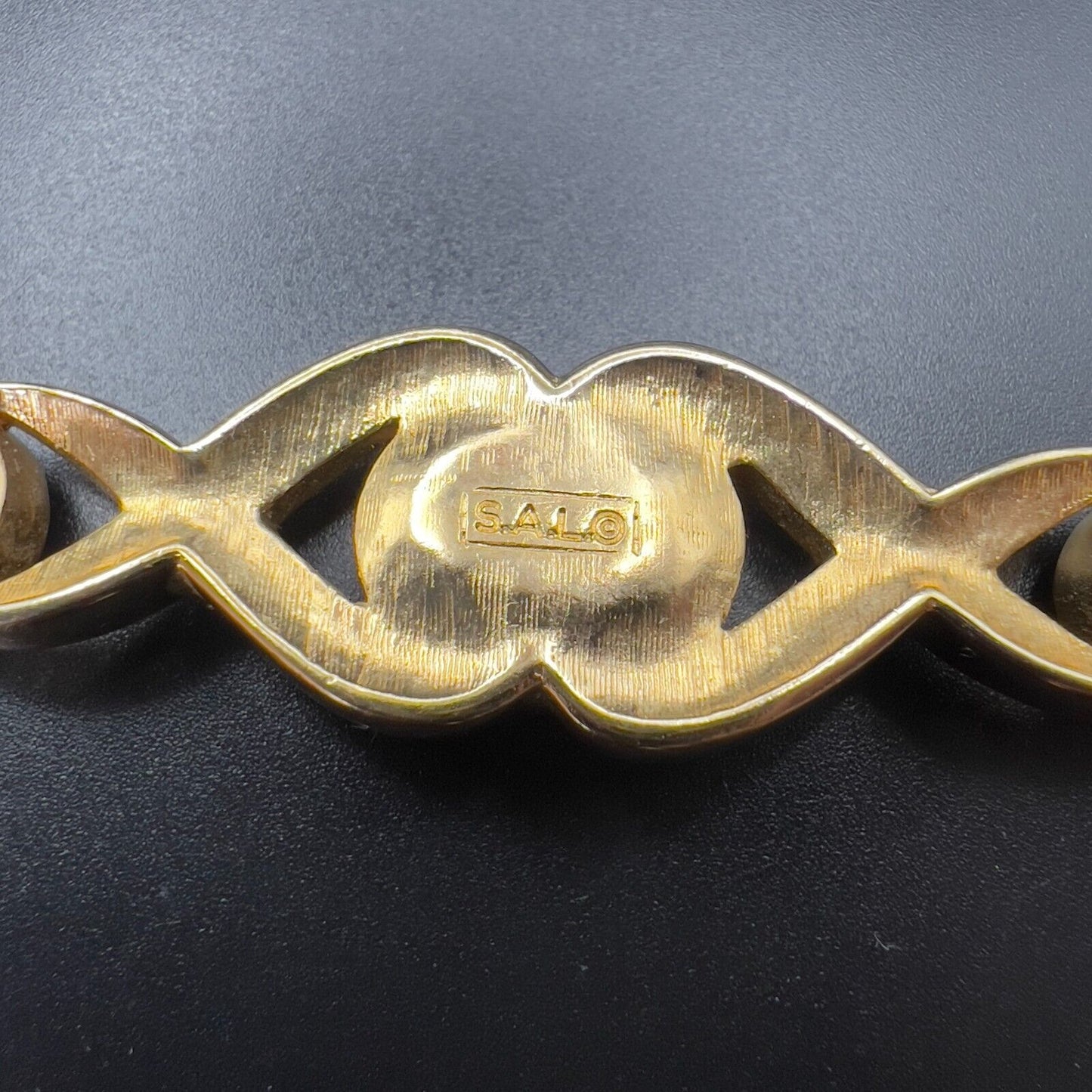 Vintage Multi-Faceted Crystal Clear Rhinestones Gold-Toned Signed SAL Brooch Pin