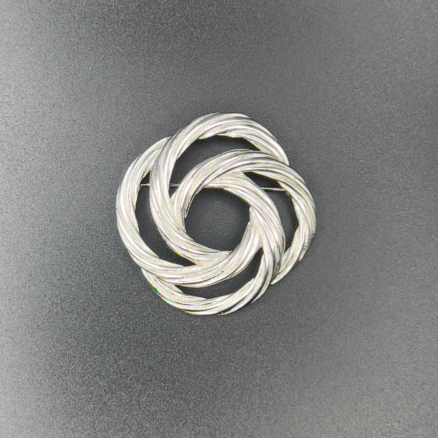 Vintage Beautiful Monet Signed Twisted Knot Silver-Toned Textured Brooch Pin