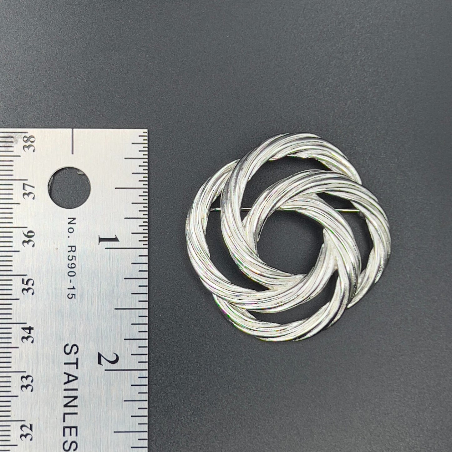 Vintage Beautiful Monet Signed Twisted Knot Silver-Toned Textured Brooch Pin