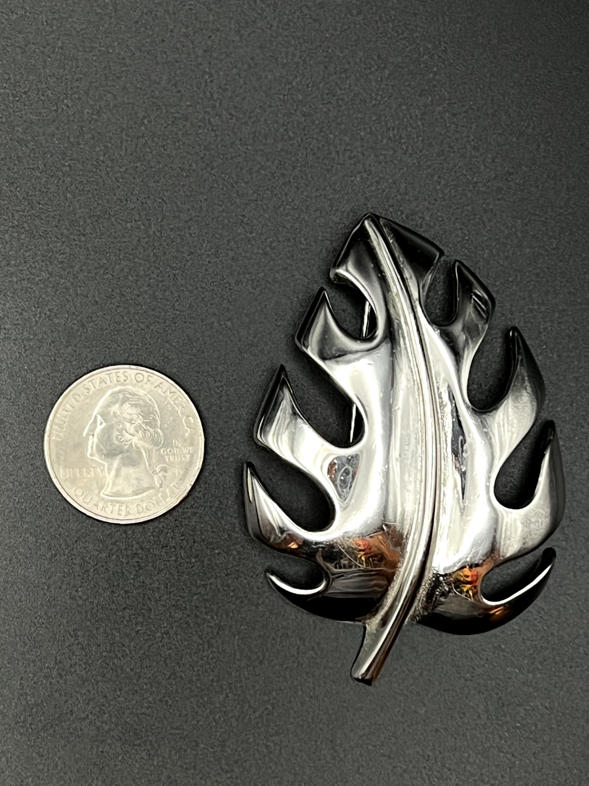 "Vintage TRIFARI leaf brooch pin back view showing clasp and construction"