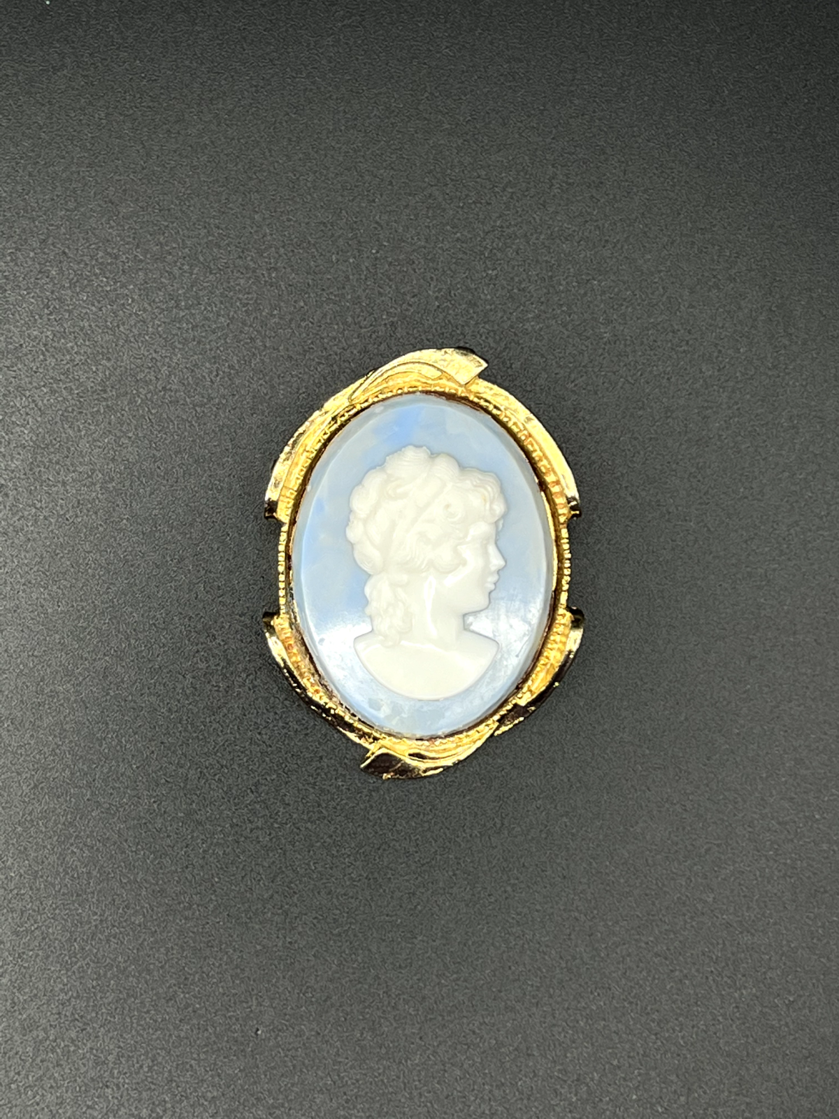 Vintage Raised Gold-Toned Framed White Cameo on a Blue Background Brooch Pin