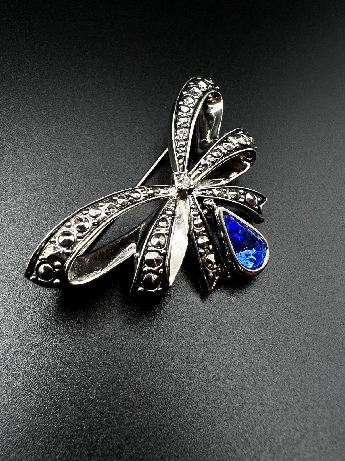 Vintage Avon signed Silver-Toned Bow a Blue Glass Teardrop Rhinestone Brooch Pin