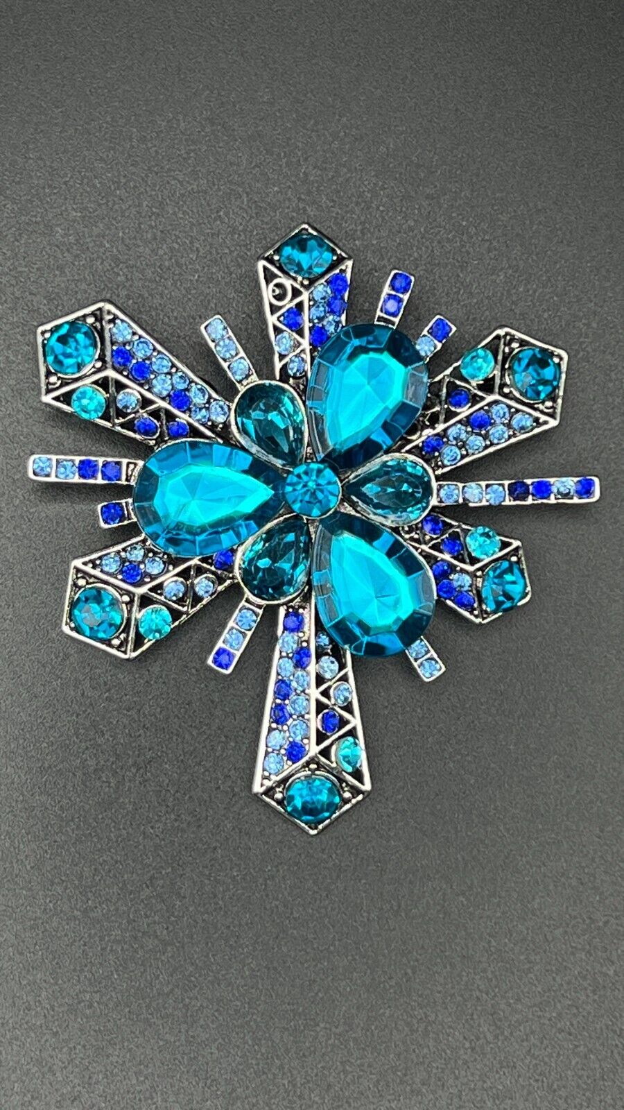 Vintage Silver-Toned Star Burst with Many Shades of Blue Crystals Brooch Pin