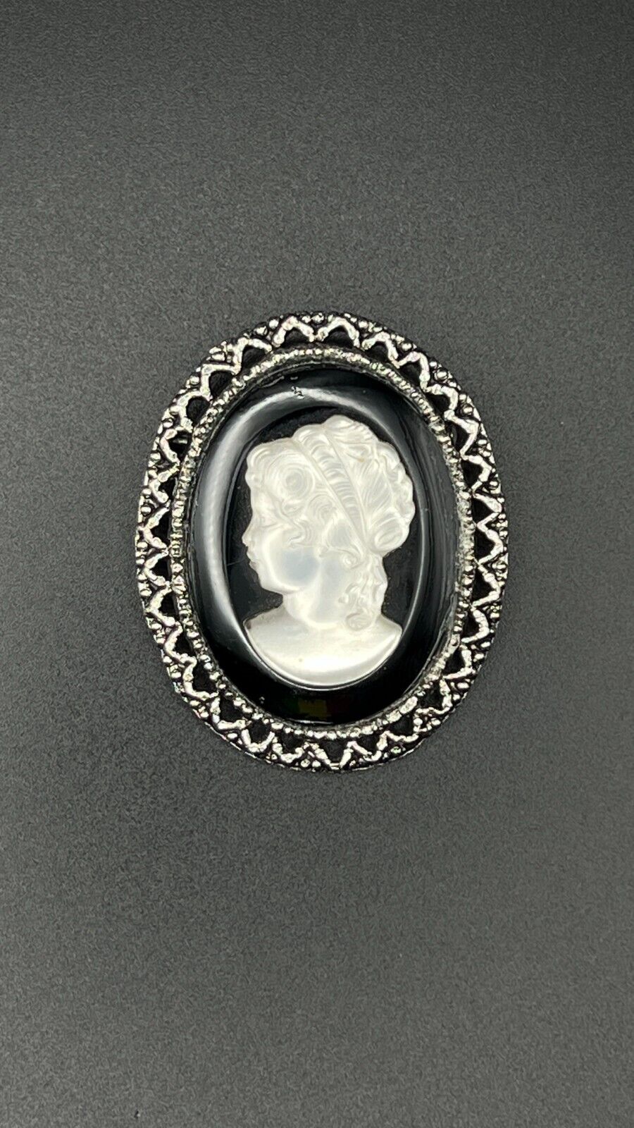 Vintage Novelty Mother Of Pearl Cameo with Black & Silver-Toned Frame Brooch Pin