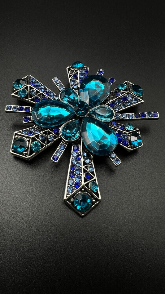 Vintage Silver-Toned Star Burst with Many Shades of Blue Crystals Brooch Pin