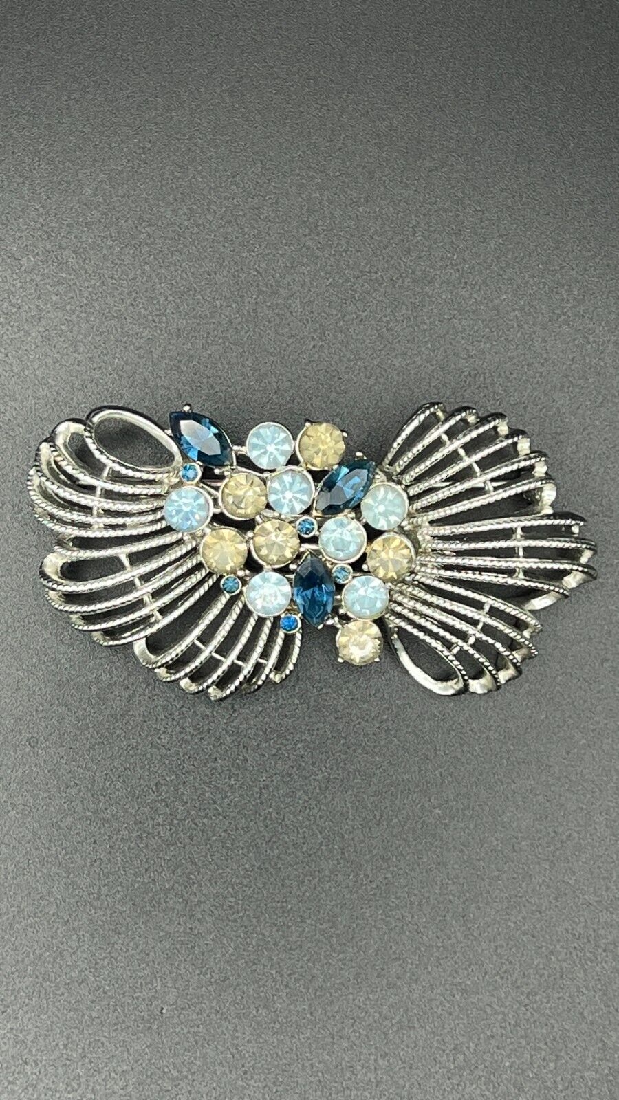 Vintage Silver-Toned String Bow with Blue & Gray Rhinestones Center Brooch Pin