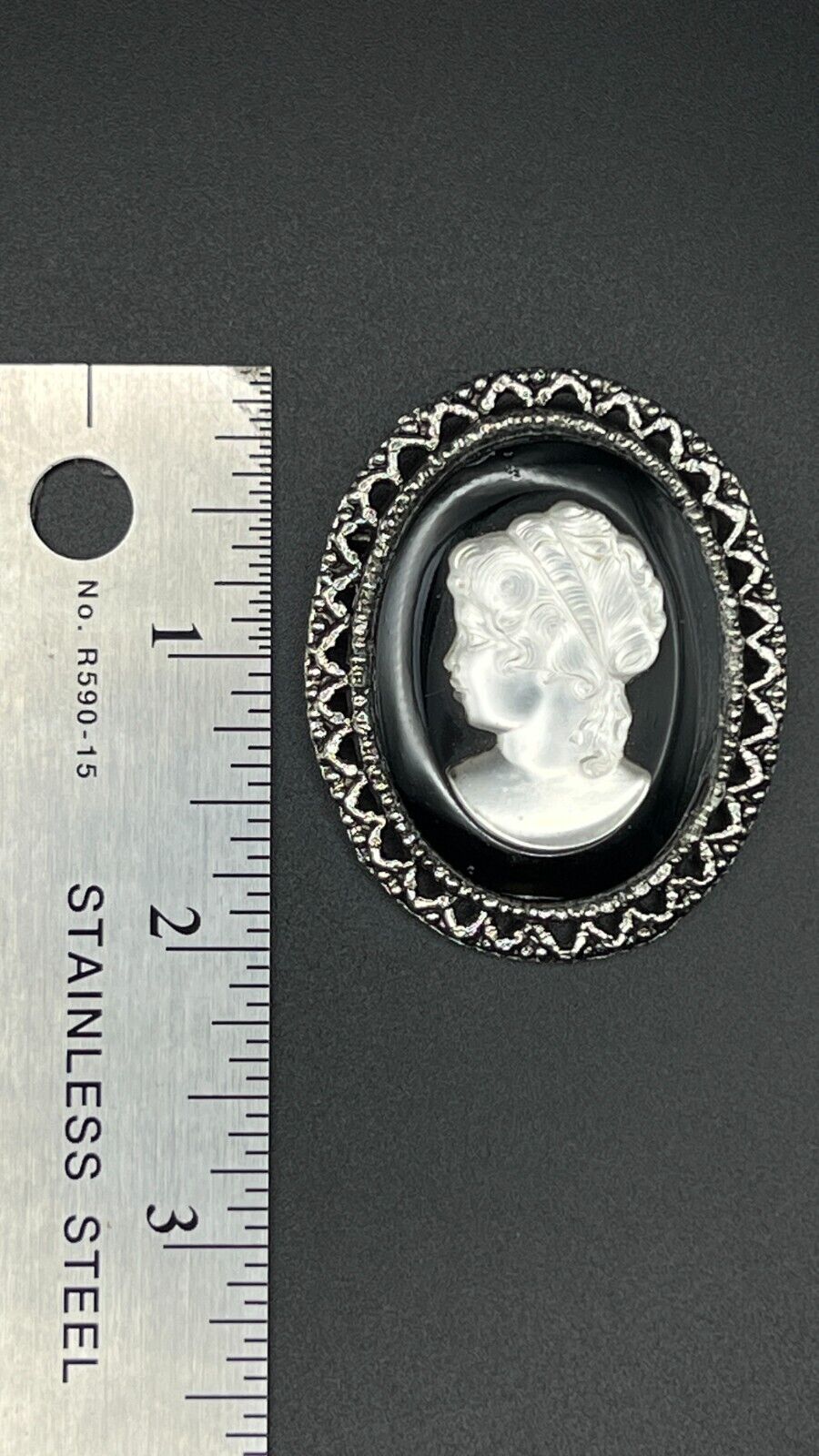 Vintage Novelty Mother Of Pearl Cameo with Black & Silver-Toned Frame Brooch Pin