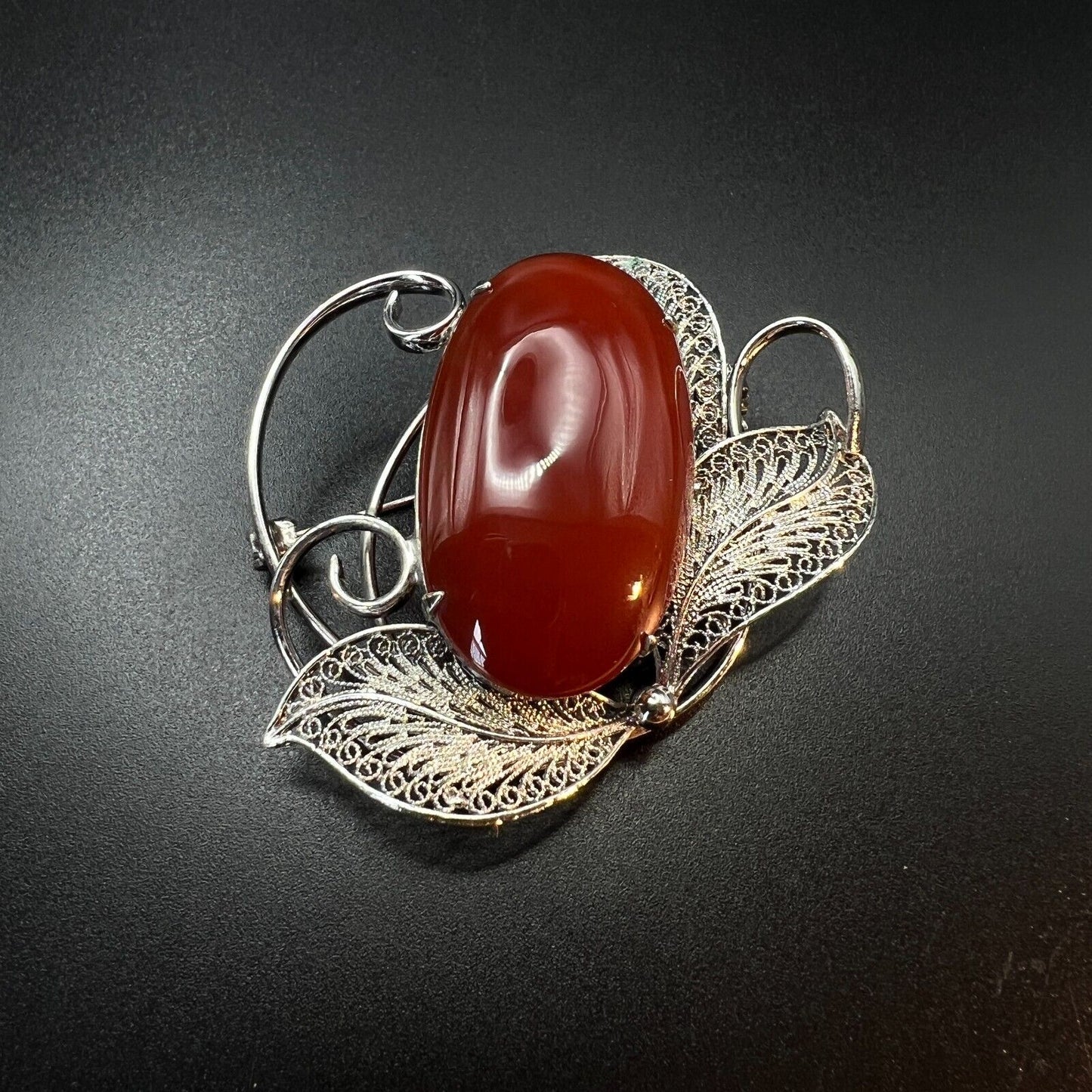 Vintage Silver-Toned Filigree with a Large Reddish Brown Cabochon Brooch Pin